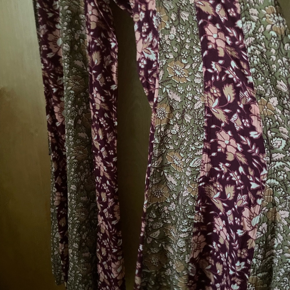 NWOT! Free People Bali Boho flare pants. Color multi reds and greens. Sizes: M,L - Picture 9 of 14